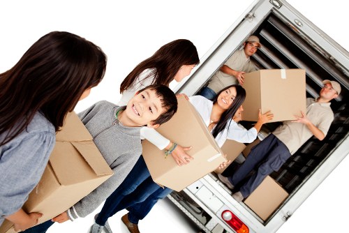 Moving team preparing belongings safely for a Frognal van service