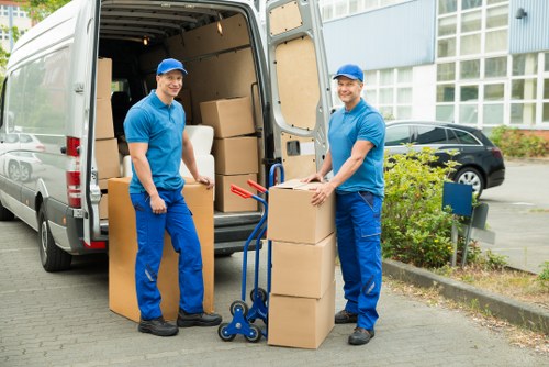 Packed household boxes and protective wrapping ready for a home move