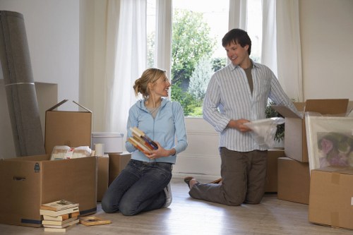 Packed boxes and furniture ready for house removals in a Frognal home