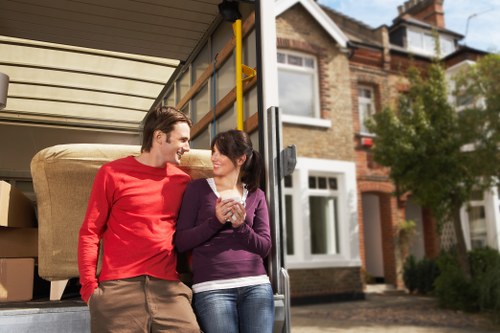Professional movers handling a flat move near Frognal
